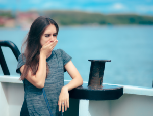 Woman with seasickness By Canva | seasickness | marinalife